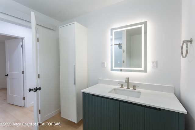 969 Caribou Peak Loop, Etna, WY 83118 - bathroom with vanity and wood finished floors