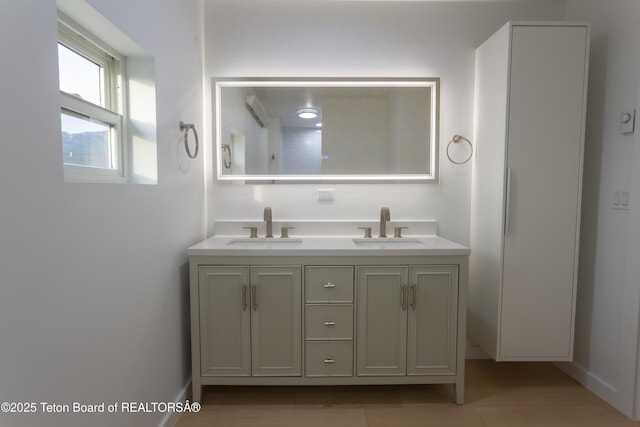 969 Caribou Peak Loop, Etna, WY 83118 - full bathroom featuring double vanity and tile patterned flooring