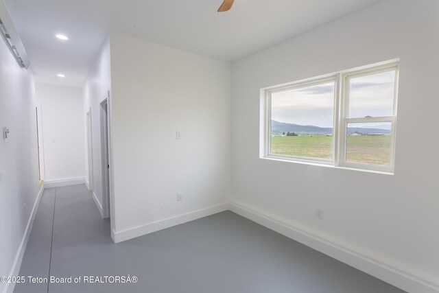 969 Caribou Peak Loop, Etna, WY 83118 - spare room with recessed lighting, concrete flooring, and ceiling fan