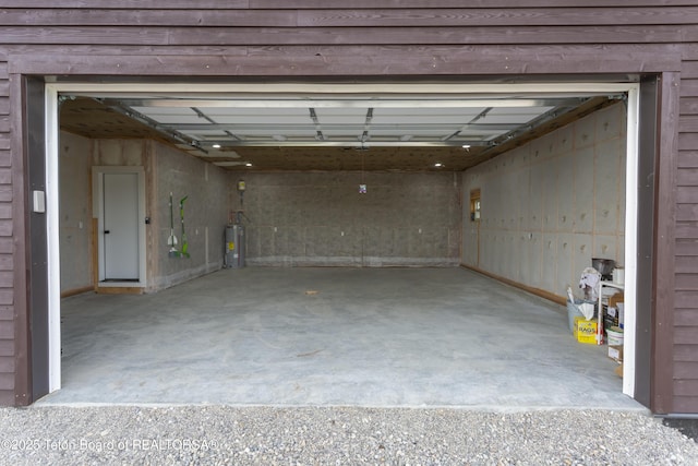 969 Caribou Peak Loop, Etna, WY 83118 - garage featuring water heater