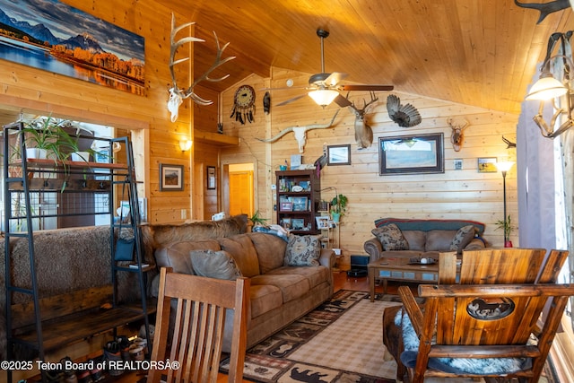 362 Snowmobile Ln, Daniel, WY 83115 - living room with lofted ceiling, wood ceiling, wood walls, a ceiling fan, and wood finished floors