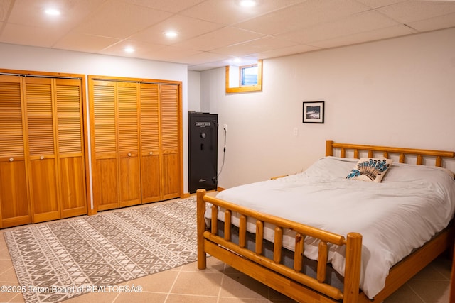 362 Snowmobile Ln, Daniel, WY 83115 - bedroom with multiple closets, recessed lighting, and a paneled ceiling