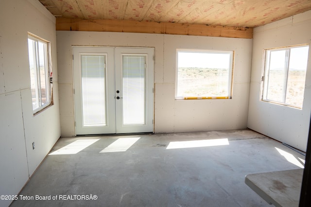 362 Snowmobile Ln, Daniel, WY 83115 - unfurnished room featuring french doors and concrete floors