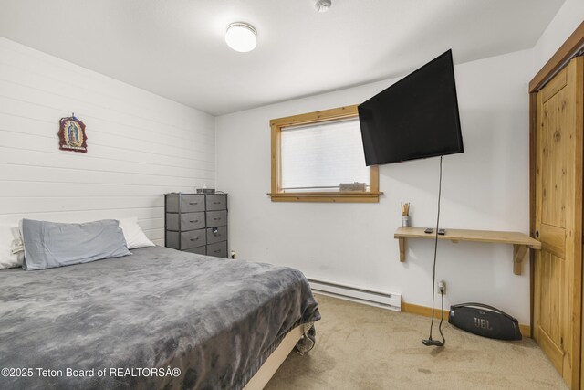 30 Stormy Cir, Jackson, WY 83001 - bedroom featuring carpet flooring, a baseboard heating unit, and baseboards