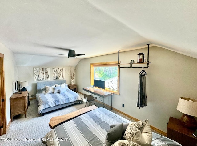 800 Dell Crk, Alpine, WY 83128 - carpeted bedroom with vaulted ceiling, baseboards, and a ceiling fan
