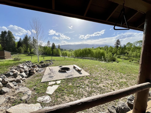 800 Dell Crk, Alpine, WY 83128 - view of yard featuring a fire pit, a patio area, and a mountain view