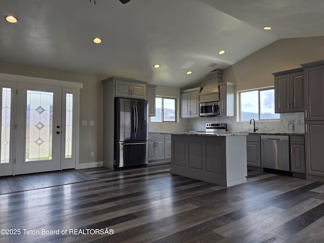 532 Palisade Trl, Driggs, ID 83422 - kitchen featuring stainless steel appliances, gray cabinetry, decorative backsplash, and a sink