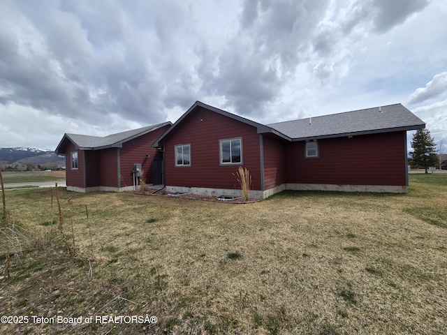 532 Palisade Trl, Driggs, ID 83422 - view of home's exterior featuring a yard and roof with shingles