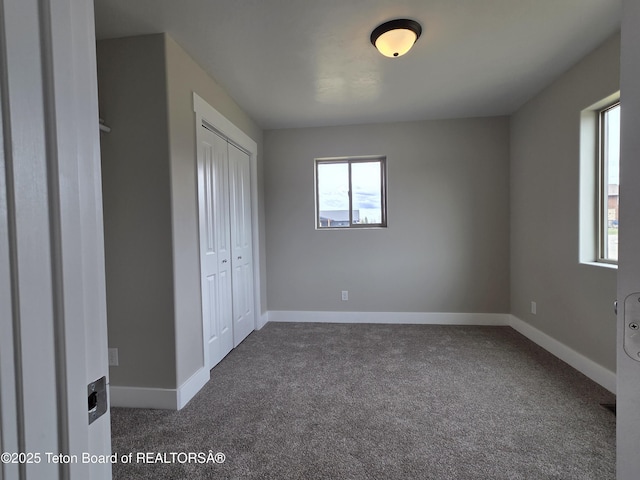 564 Palisade Trl, Driggs, ID 83422 - unfurnished bedroom featuring baseboards, carpet, and a closet