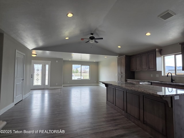 564 Palisade Trl, Driggs, ID 83422 - kitchen featuring ceiling fan, visible vents, dark wood finished floors, a sink, and lofted ceiling