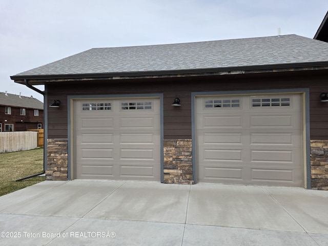 564 Palisade Trl, Driggs, ID 83422 - garage featuring fence and driveway
