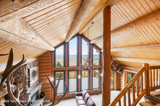 interior space with rustic walls, lofted ceiling with beams, wood ceiling, and an inviting chandelier