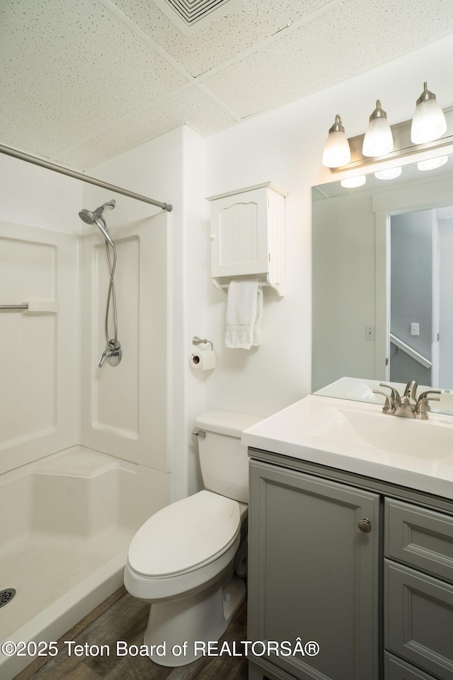 811 Jade St, Pinedale, WY 82941 - bathroom with a stall shower, vanity, and toilet