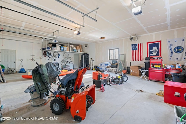 garage featuring a garage door opener