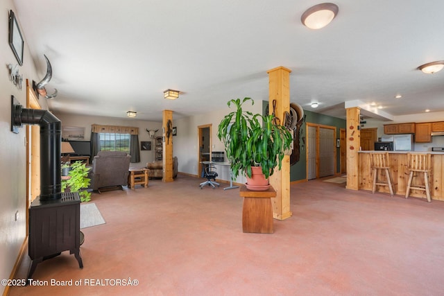 86 Hawks Rest Rd, Etna, WY 83118 - living area with light colored carpet, baseboards, and recessed lighting