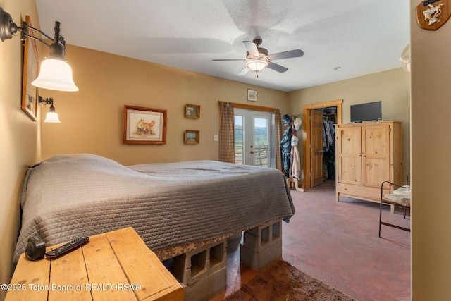 86 Hawks Rest Rd, Etna, WY 83118 - bedroom featuring access to outside, carpet flooring, and a ceiling fan