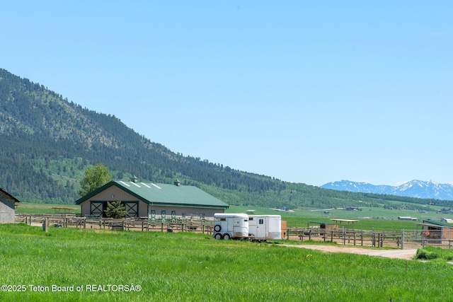 86 Hawks Rest Rd, Etna, WY 83118 - mountain view featuring rural landscape, a heavily wooded area, and a pastoral area
