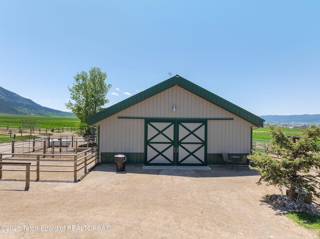 86 Hawks Rest Rd, Etna, WY 83118 - view of outdoor structure with an exterior structure, a mountain view, and a view of countryside