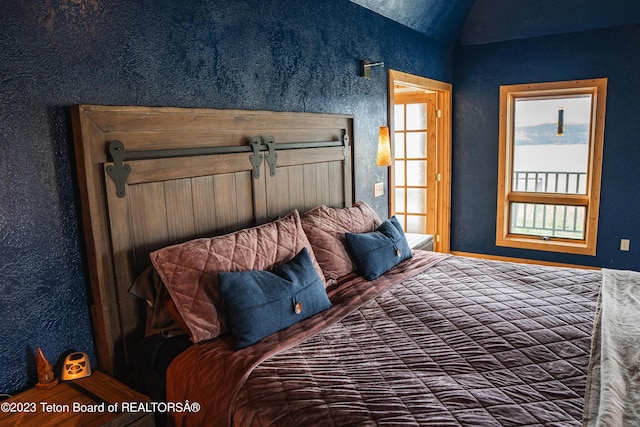 4 Beaver Ridge Rd, Daniel, WY 83115 - bedroom with a textured wall and vaulted ceiling