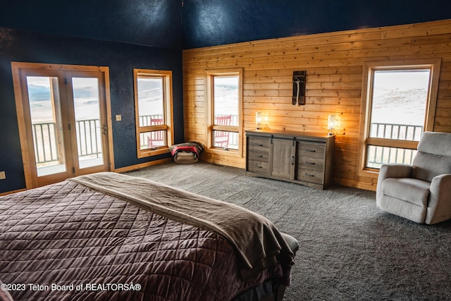 4 Beaver Ridge Rd, Daniel, WY 83115 - bedroom with carpet floors, access to outside, and wood walls