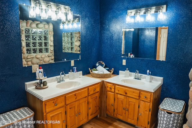 4 Beaver Ridge Rd, Daniel, WY 83115 - full bath featuring wood finished floors, a sink, and two vanities