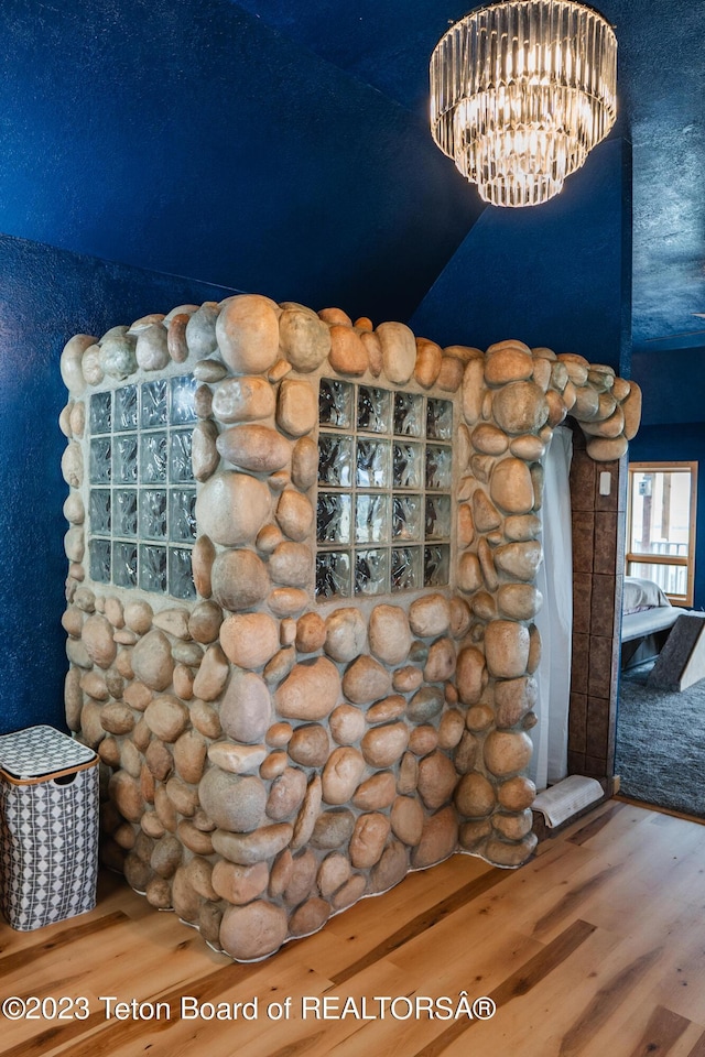 4 Beaver Ridge Rd, Daniel, WY 83115 - interior details with wood finished floors and a chandelier