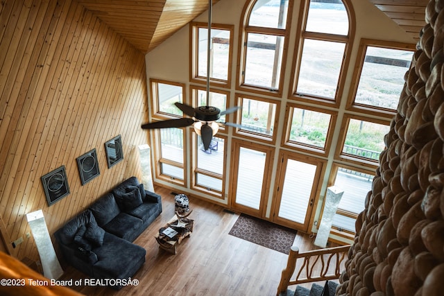 4 Beaver Ridge Rd, Daniel, WY 83115 - living room with wooden walls, high vaulted ceiling, and wood finished floors