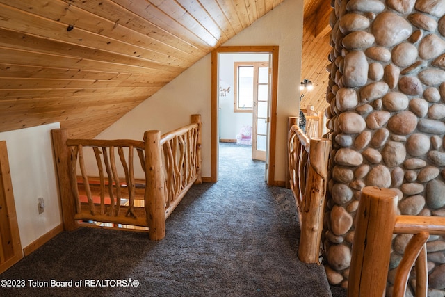 4 Beaver Ridge Rd, Daniel, WY 83115 - hall featuring carpet, baseboards, an upstairs landing, vaulted ceiling, and wood ceiling