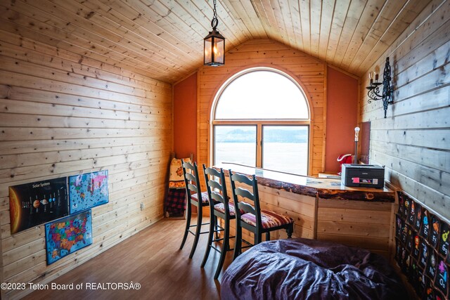 4 Beaver Ridge Rd, Daniel, WY 83115 - bar with wood ceiling, hanging light fixtures, wood walls, wood finished floors, and lofted ceiling