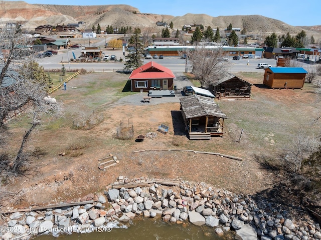 611 W Ramshorn St, Dubois, WY 82513 - view from above of property with a mountainous background