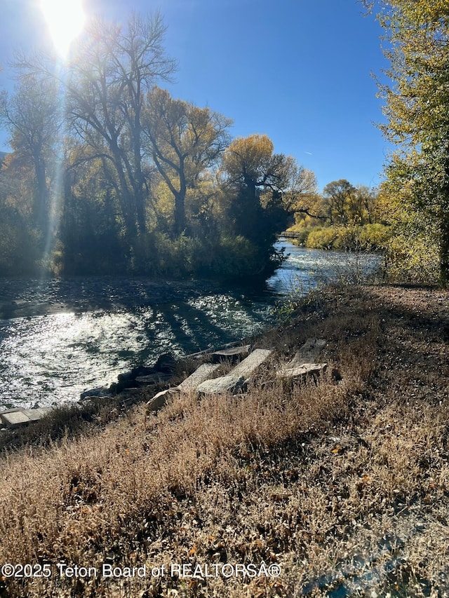 611 W Ramshorn St, Dubois, WY 82513 - view of yard featuring a water view