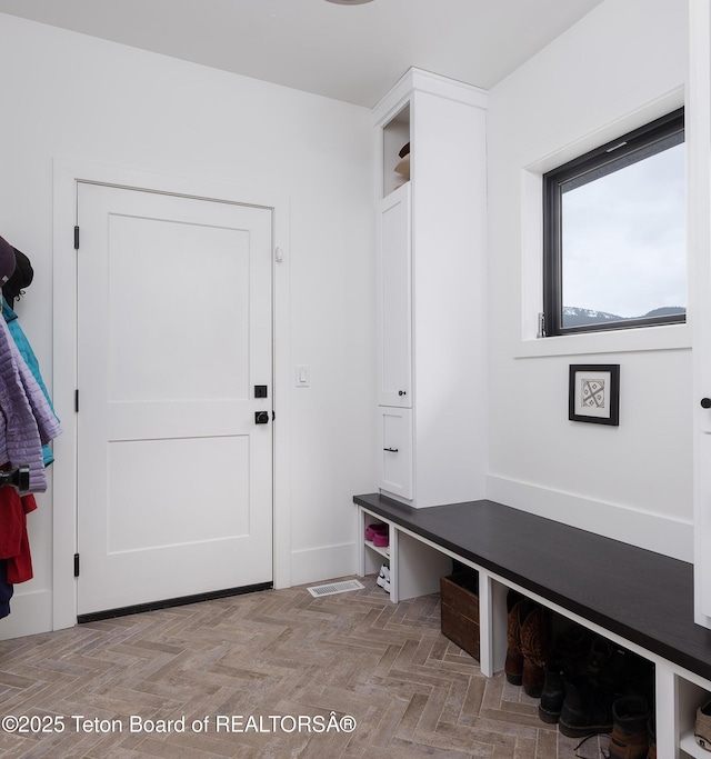 mudroom featuring visible vents