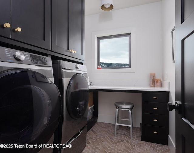 laundry area with separate washer and dryer, brick floor, and cabinet space