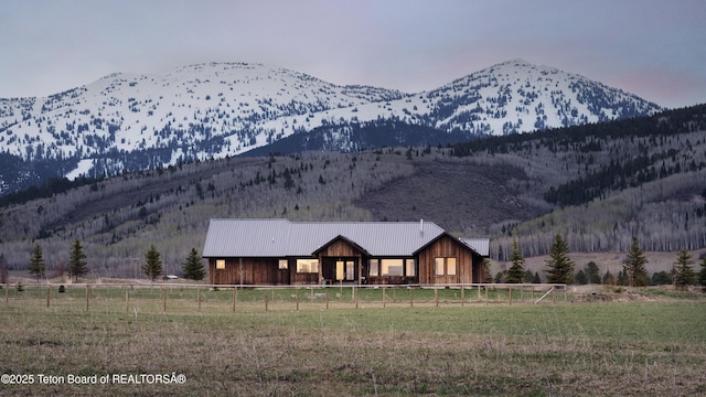 mountain view featuring a rural view