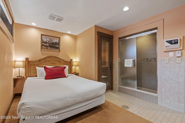 7250 N Rachel Way Unit 6, Teton Village, WY 83025 - bedroom with tile patterned floors and recessed lighting