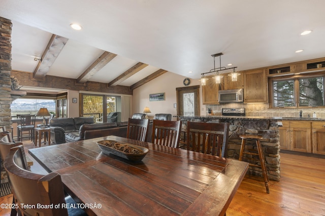 7250 N Rachel Way Unit 6, Teton Village, WY 83025 - dining space featuring plenty of natural light, light wood-style floors, and recessed lighting