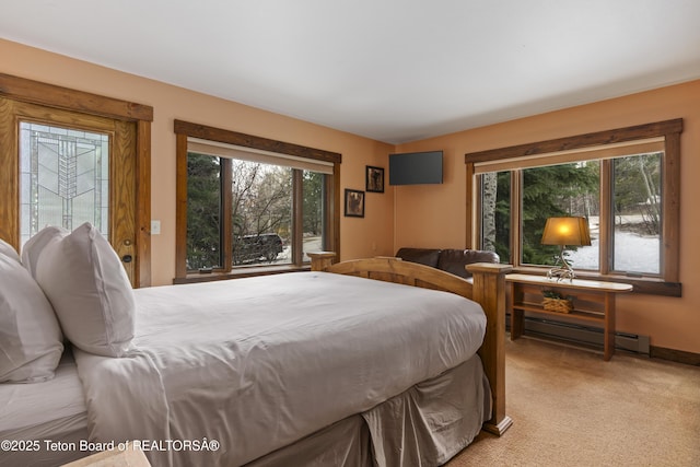 7250 N Rachel Way Unit 6, Teton Village, WY 83025 - carpeted bedroom featuring baseboard heating and baseboards