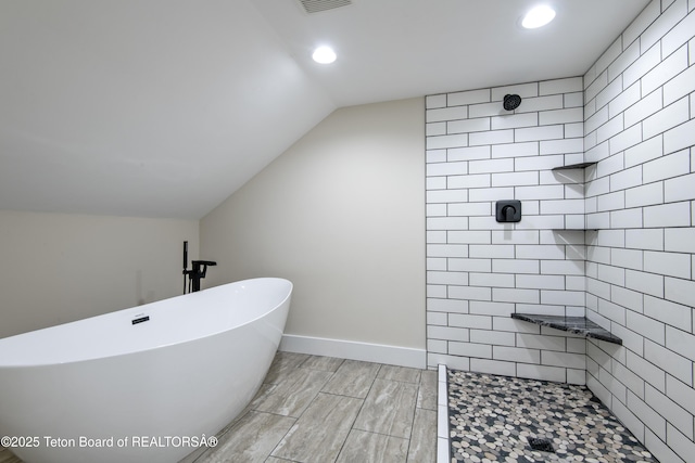 4444 Tails Down Rd, Tetonia, ID 83452 - full bath featuring tiled shower, vaulted ceiling, recessed lighting, a soaking tub, and wood finished floors