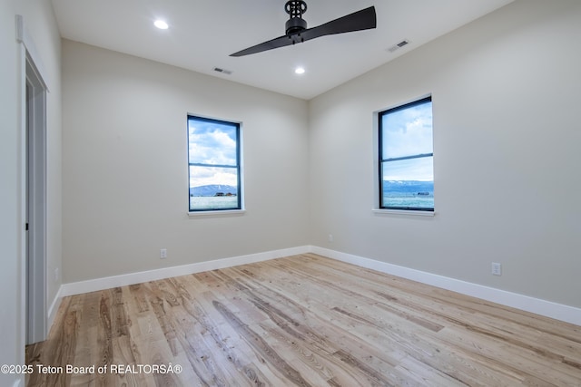 4444 Tails Down Rd, Tetonia, ID 83452 - spare room with wood finished floors, a ceiling fan, recessed lighting, and baseboards
