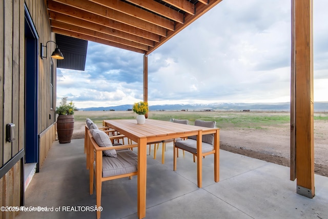 4444 Tails Down Rd, Tetonia, ID 83452 - view of patio with outdoor dining space, a mountain view, and a view of rural / pastoral area