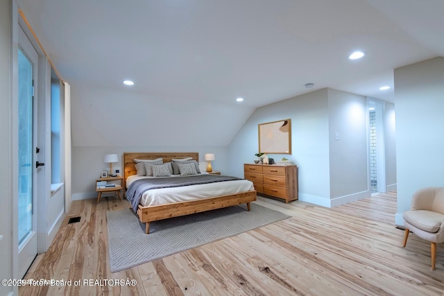 4444 Tails Down Rd, Tetonia, ID 83452 - bedroom featuring light wood finished floors, lofted ceiling, baseboards, and recessed lighting