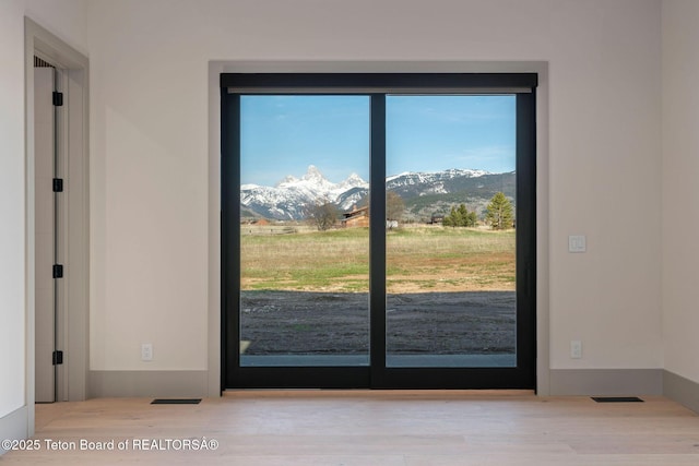 1404 Canyon Sunrise, Driggs, ID 83422 - entryway with a mountain view and wood finished floors