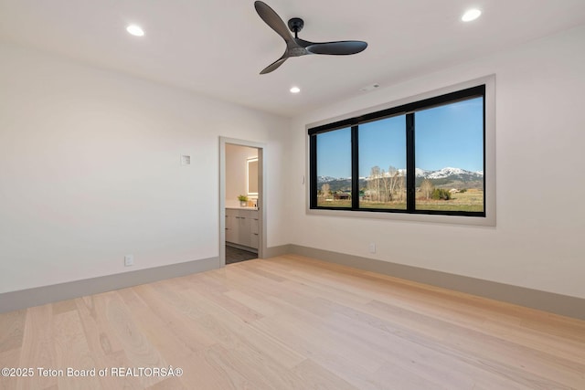 1404 Canyon Sunrise, Driggs, ID 83422 - empty room with recessed lighting, wood finished floors, a ceiling fan, and baseboards