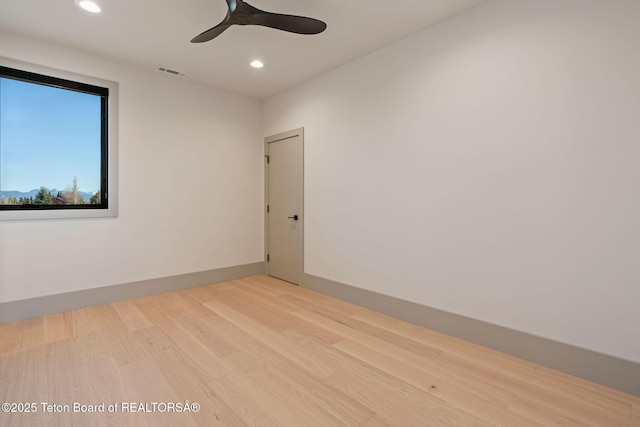 1404 Canyon Sunrise, Driggs, ID 83422 - spare room featuring wood finished floors, recessed lighting, and a ceiling fan