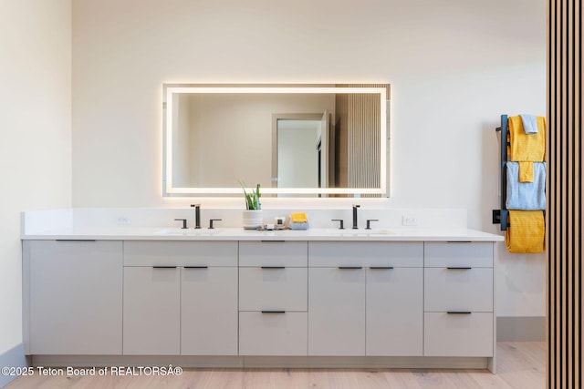 1404 Canyon Sunrise, Driggs, ID 83422 - full bathroom with double vanity and wood finished floors