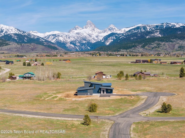 1404 Canyon Sunrise, Driggs, ID 83422 - view of mountain backdrop with rural landscape and a pastoral area