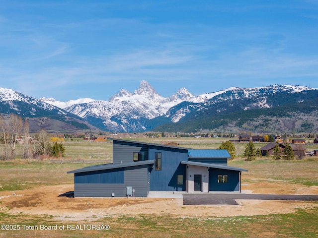 1404 Canyon Sunrise, Driggs, ID 83422 - view of front of property featuring a mountain view and a view of rural / pastoral area