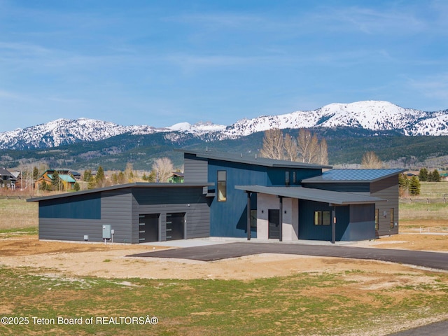 1404 Canyon Sunrise, Driggs, ID 83422 - contemporary house featuring a mountain view