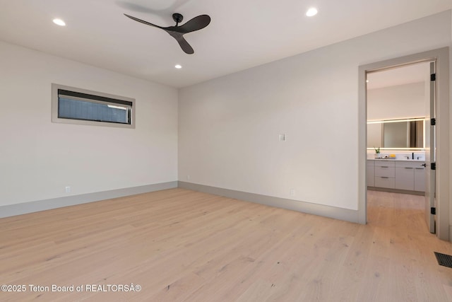 1404 Canyon Sunrise, Driggs, ID 83422 - spare room with ceiling fan, light wood finished floors, recessed lighting, and baseboards