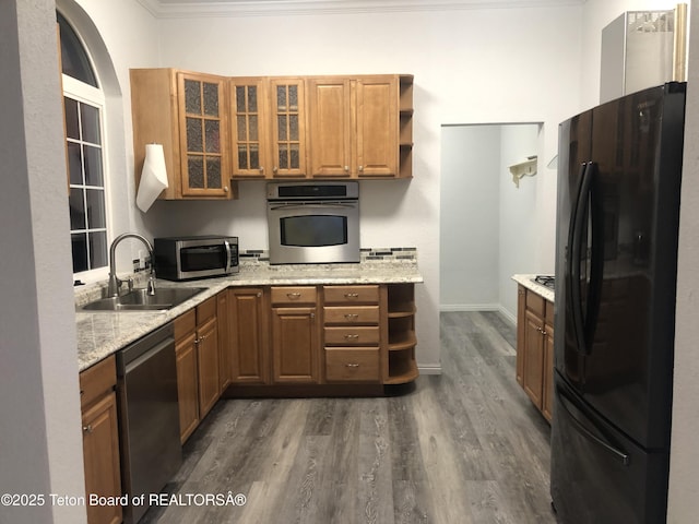 kitchen featuring a sink, dark wood finished floors, open shelves, and appliances with stainless steel finishes